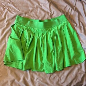 Green All In Motion pleated tennis skirt